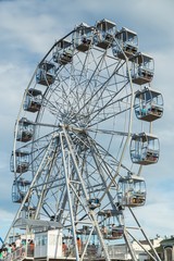 Ferris wheel against a blue sky