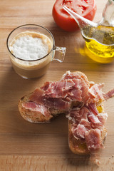 Pan tumaca. Bread with tomato and jamon serrano with olive oil