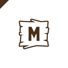 Wooden alphabet or font blocks with letter m in wood texture area with outline.