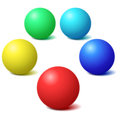 Colorful glossy spheres with shadows isolated on white