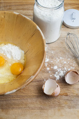 Flour and eggs in a bowl