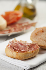 Pan tumaca. Bread with tomato and jamon serrano with olive oil