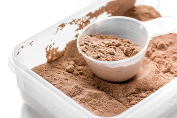 protein powder for fitness nutrition to white training stone background