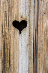 The wooden door with heart. Background