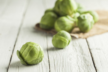 Brussels sprouts on wooden table