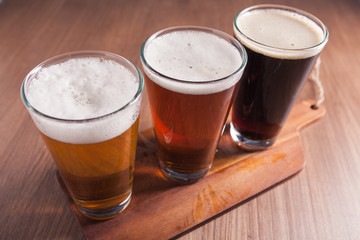     Assorted beers in a flight ready for tasting 