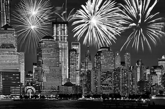 Fototapeta New York Manhattan skyline at night, with fireworks, american US celebration and party, black and white image