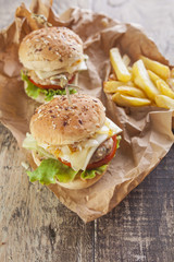 Deluxe gourmet burger on wooden table