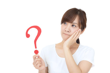 疑問符を持つ女性
