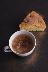 Coffee cup and a piece of cake