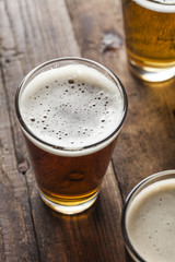 Three glasses with differet beers