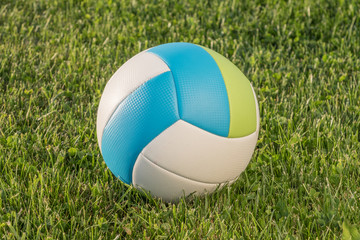 Fototapeta na wymiar Sports ball on the grass