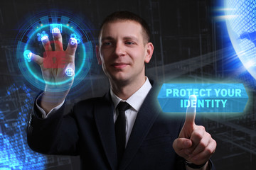 Business, Technology, Internet and network concept. Young businessman working on a virtual screen of the future and sees the inscription: Protect your identity