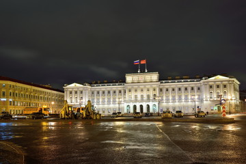 Construction equipment in front of the Legislative Assembly of St. Petersburg night