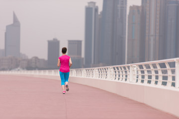 woman running on the promenade