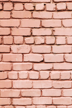 Old pink grey brick wall background vertical. Toned