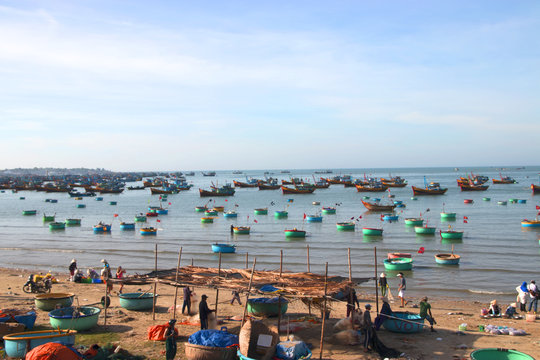 Vietnamese fishing village, Mui Ne, Vietnam, Southeast Asia.in February 23, 2017. Landscape with sea and traditional colorful fishing boats