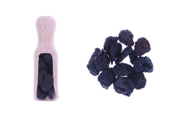 Dried cherries fruits in wooden spoon