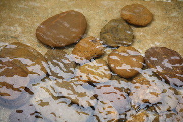 rock in the clear water 