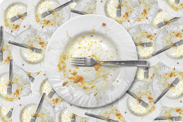 View from above on empty plate, dirty after the meal is finished
