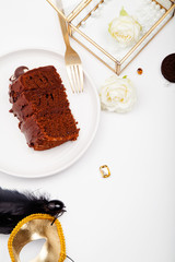 Vertical mockup with pieces of chocolate cake, white roses and delicious cookies. Polished and chic branding concept