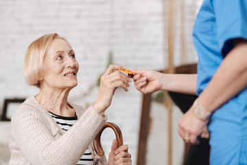 Adorable senior woman improving her immune system