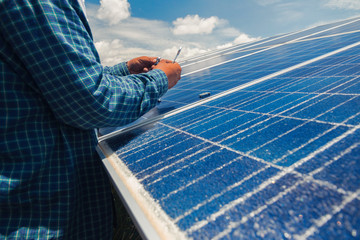engineer and electrician team swapping and install solar panel ; electrician team checking hot spot...