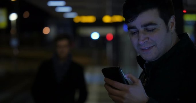 Pickpocket steals man's smartphone at night. 