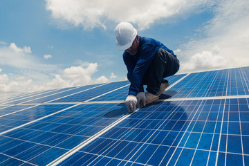 engineer and electrician team swapping and install solar panel ; electrician team checking hot spot on break panel
