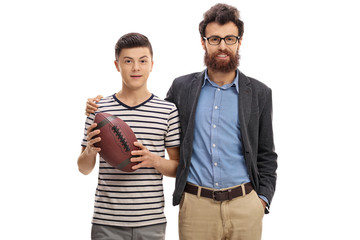 Father and son with a rugby ball
