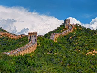 Perspective view on famous beautiful ancient Chinese Great Wall monument made of bricks stones. China architecture. China holidays vacation tours trips travel people tourists. Sightseeing point