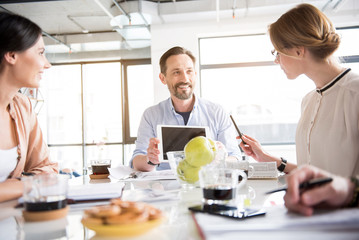 Cheerful team of office workers