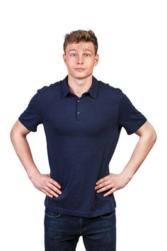 Man in navy polo t-shirt on white background with smile.