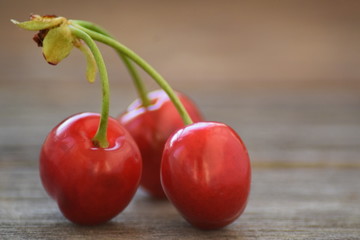Cherry macro on wooden table 
