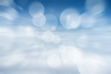 Motion background, bokeh above clouds