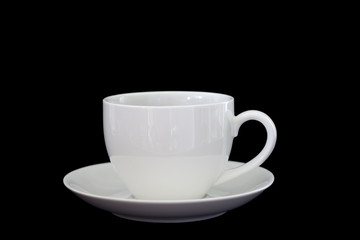 Black coffee in white cup on dark background