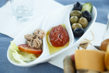 Spicy paste, olives and tuna. Traditional Tunisian appetizer.
