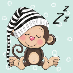 Obraz premium Śpiąca śliczna małpa w kapturze