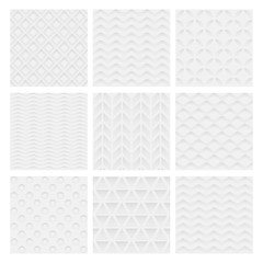 Set of white relief seamless patterns