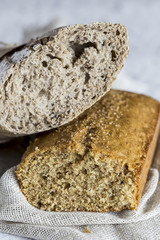 Integral cake and bread on old wooden table