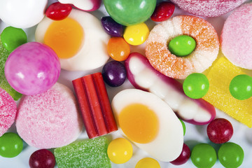 Fototapeta na wymiar colorful candies and jellies background