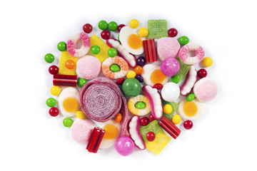 Mixed colorful candies isolated on white