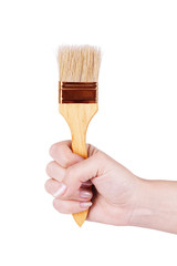 Hand with brush isolated on white background