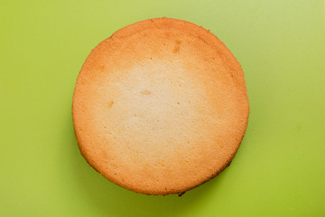 sponge cake on a green table