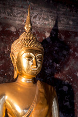 Buddha statue, Suthat Thepphaararam is a Buddhist temple in Bangkok, Thailand.