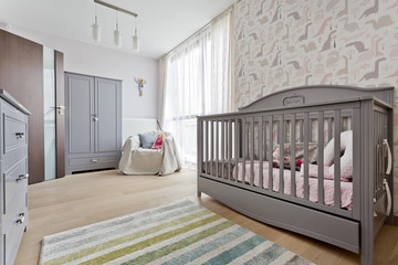 Nursery with wooden grey cradle