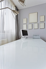 White desk top with computer