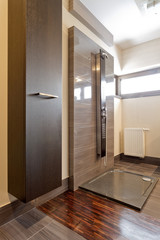 Modern open shower with marble tiles