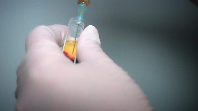 4K Close-up Doctor Collecting Plasma for PRP Facelift