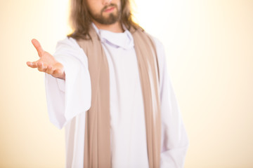 Jesus reaching out his hand